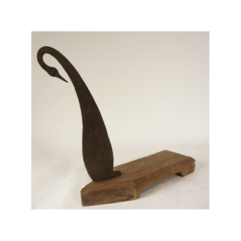 Iron and wood coconut shell cutter