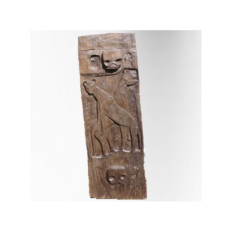 Carved Naga panel with hyena motif and skull