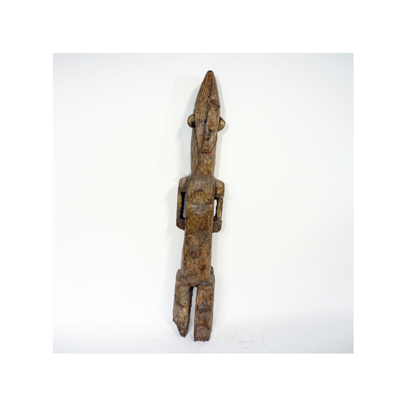 Male figure, Nigeria, Ibo. Wood with brown patina