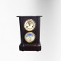 Black lacquered mantel clock with moon phase indicator, 19th century
