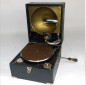 Portable phonograph in its rectangular case