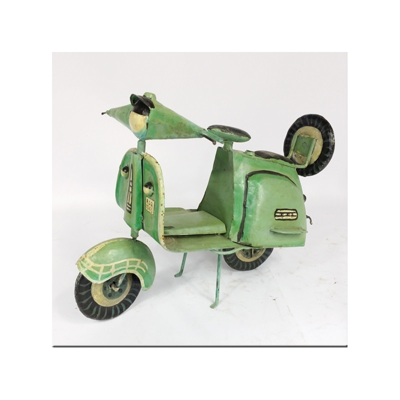 Small tin scooter