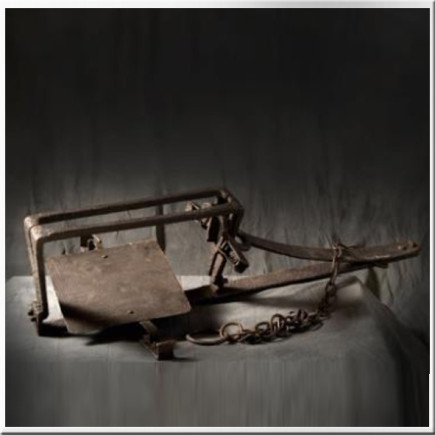 Piège en fer forgé