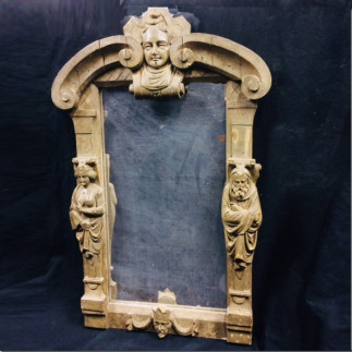 Miroir rectangulaire en bois stuck decor de mascarons XVIIIème S.
