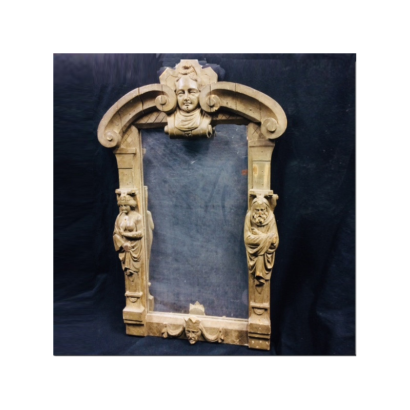 Rectangular wooden mirror featuring carved mascaron decorations 18th century