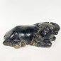 Black marble lying down cow early 19th century