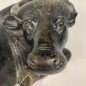 Black marble lying down cow early 19th century