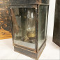 Petroleum sheet and glass lamp in a wooden box