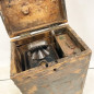 Petroleum sheet and glass lamp in a wooden box