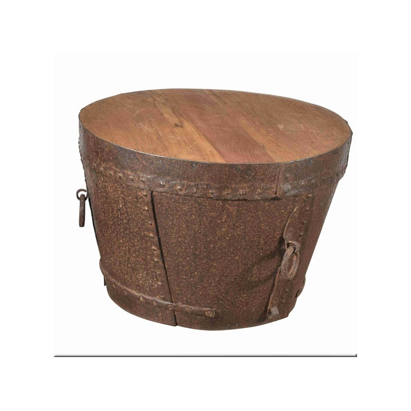 Hammered iron potty forming a coffee table