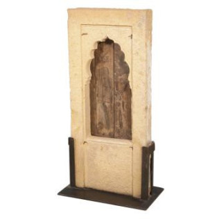 Small rectangular window in carved stone with pointed arch 18th century