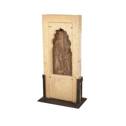 Small rectangular window in carved stone with pointed arch 18th century