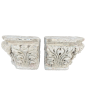 Pair of corner capitals in carved stone décorated with stylised foliage and flowers 13th century