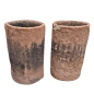 Pair of cylindrical monoblock vases in carved pink sandstone 19th century