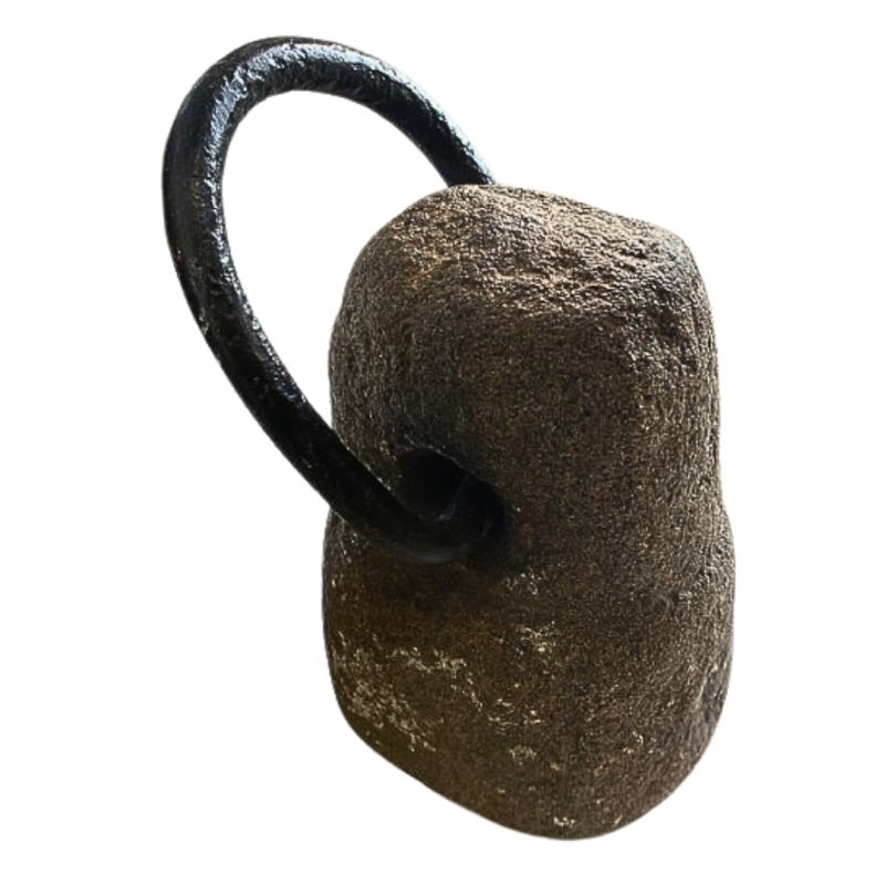 Granite weight fitted with iron lifting ring 17th century