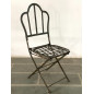 Pair of folding wrought iron chairs.