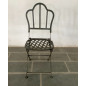 Pair of folding wrought iron chairs.