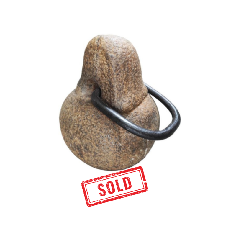 Granite weight fitted with iron lifting ring 17th century