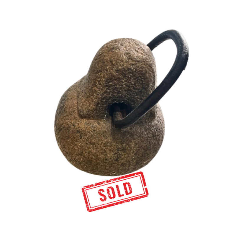 Granite weight fitted with iron lifting ring 17th century