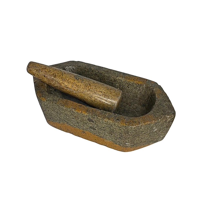 Small two-tone oval shaped marble mortar with two sides pinches, accompanied by its marble pestle.  18th Century.