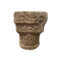 Carved stone capital, decorated on all sides. 12th Century.