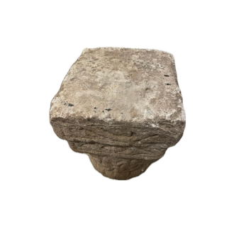 Carved stone capital, decorated on all sides. 12th Century.