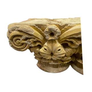 Double capital of stone applique carved in high relief. 13th - 14th Century.