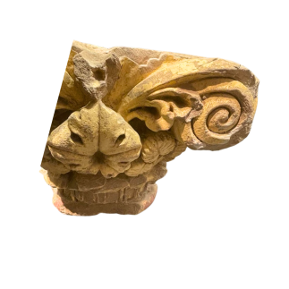 Double capital of stone applique carved in high relief. 13th - 14th Century.