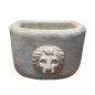Half-round white marble basin with lion’s head decoration. 19th Century.