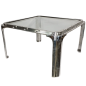 Square aluminum porthole mounted as a table
